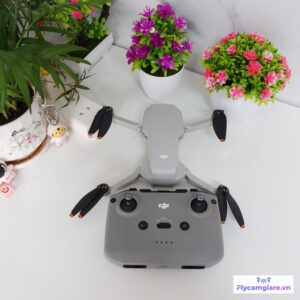 Flycam DJI Mini 2 Cũ Đã Qua Sử Dụng 29 Flycam DJI Mini 2 Cũ Like New Đã Qua Sử Dụng và diều khiển